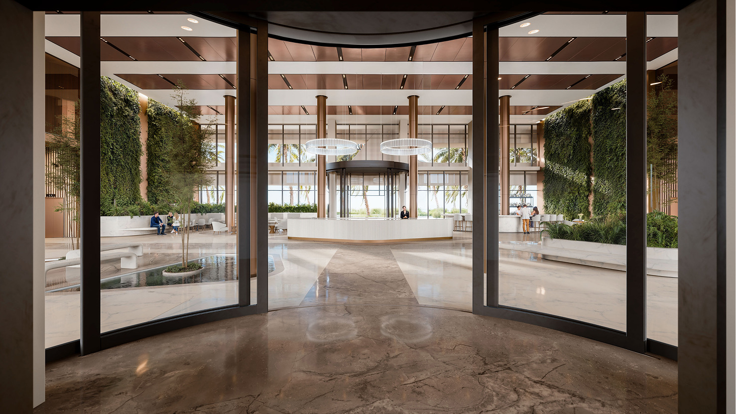 Luxurious lobby with glass doors and greenery walls