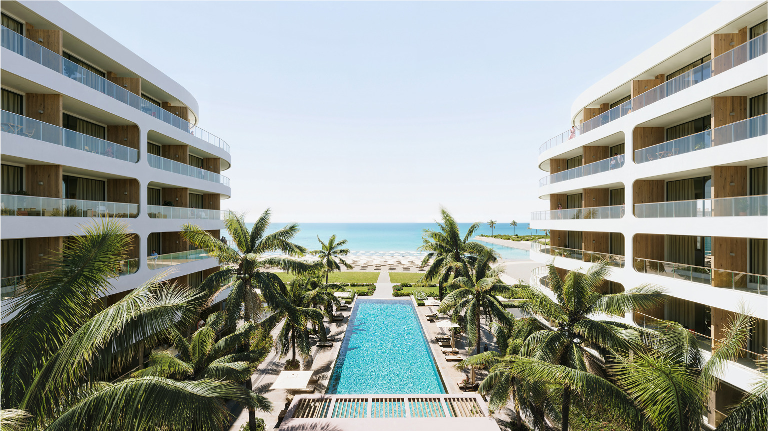 Luxury Palm Beach hotel with ocean view and infinity pool.