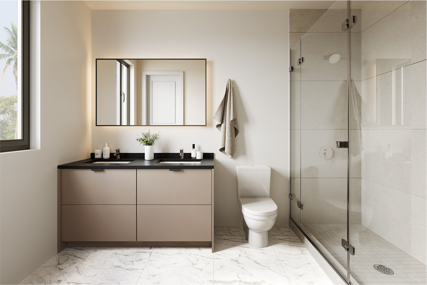 Modern bathroom with double vanity, toilet, and glass shower enclosure.