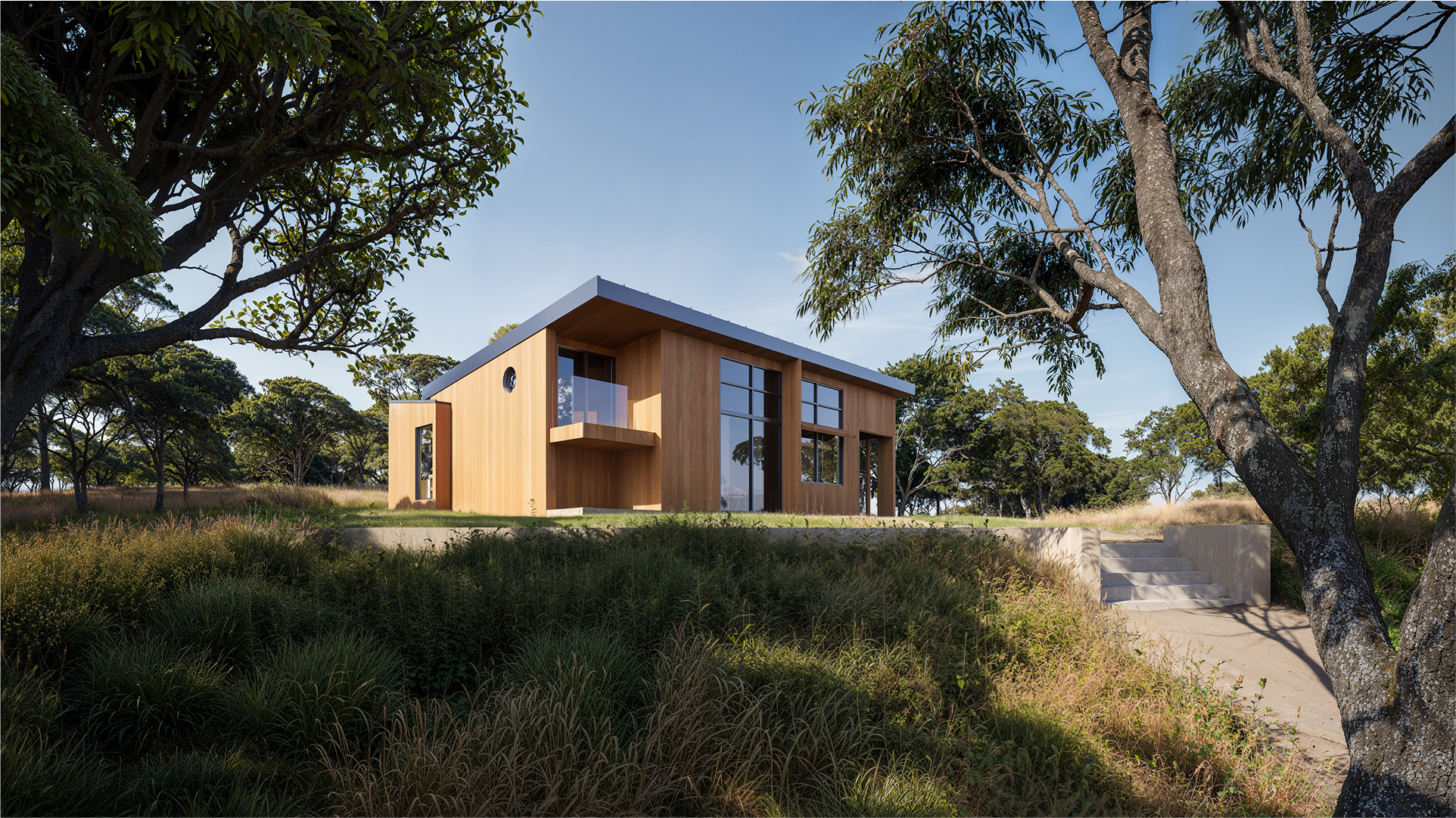 Modern wood home nestled in a grassy hillside at Chalk Hill.