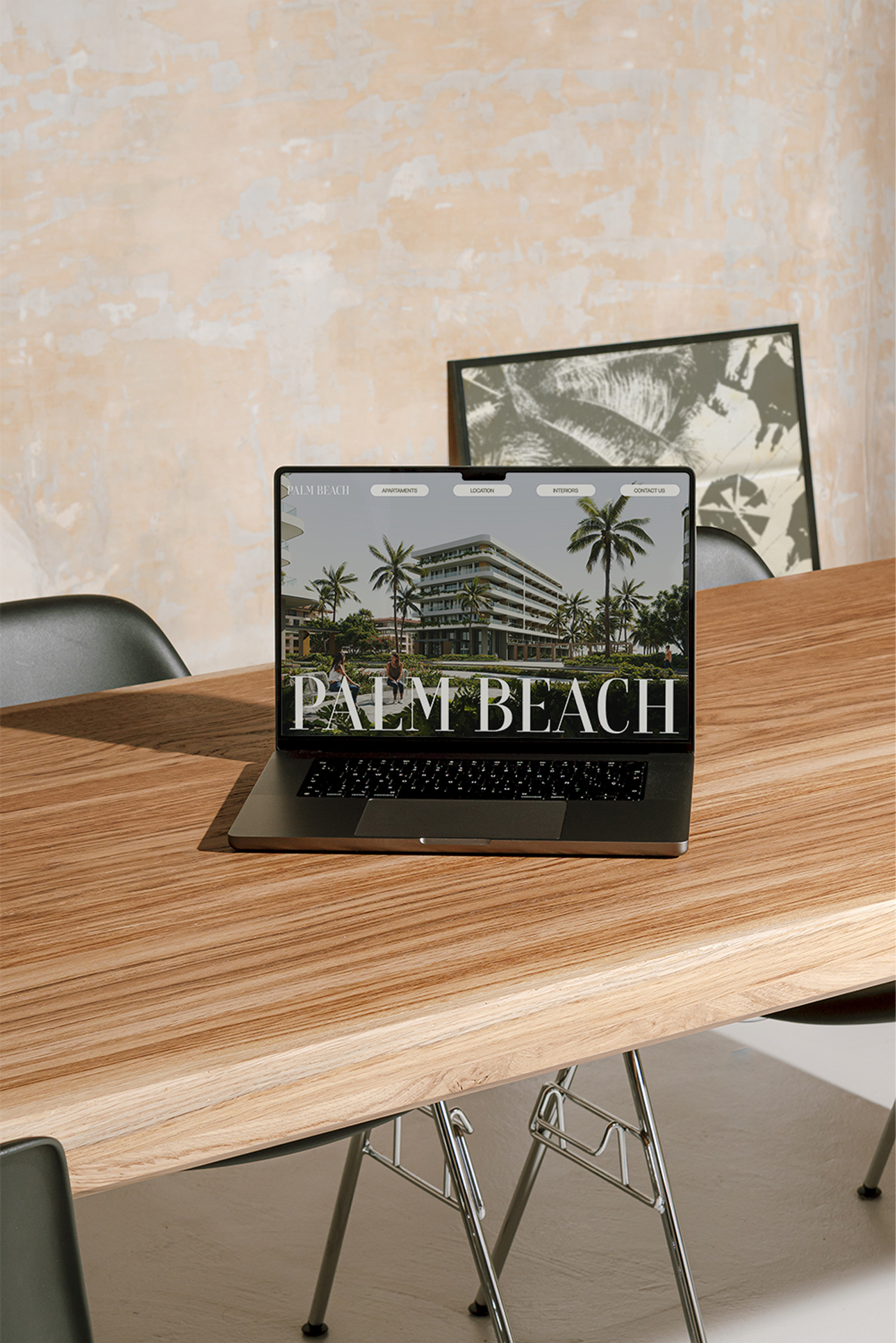 Laptop displaying Palm Beach real estate website