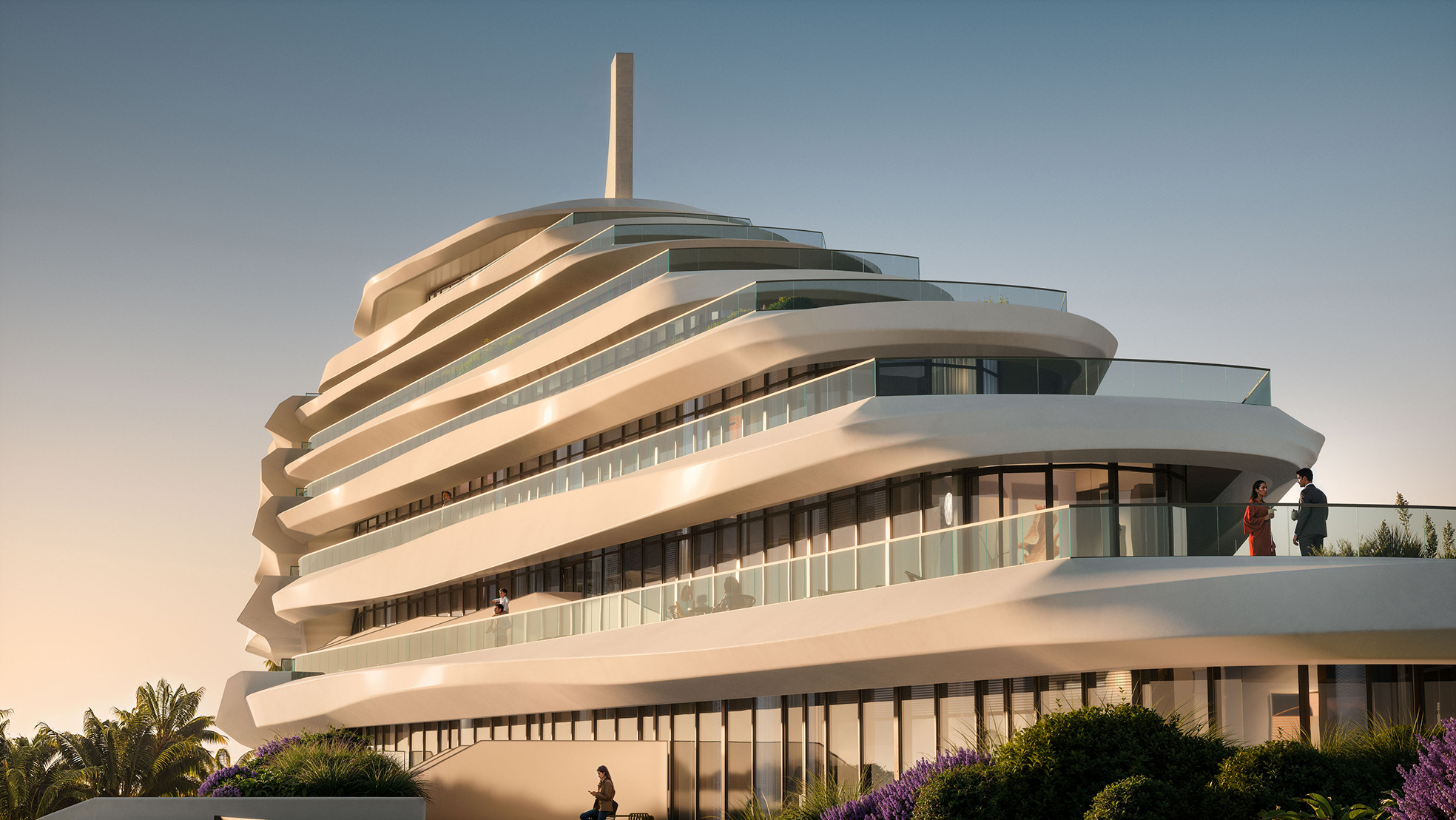 Modern multi-level building resembling a cruise ship at sunset