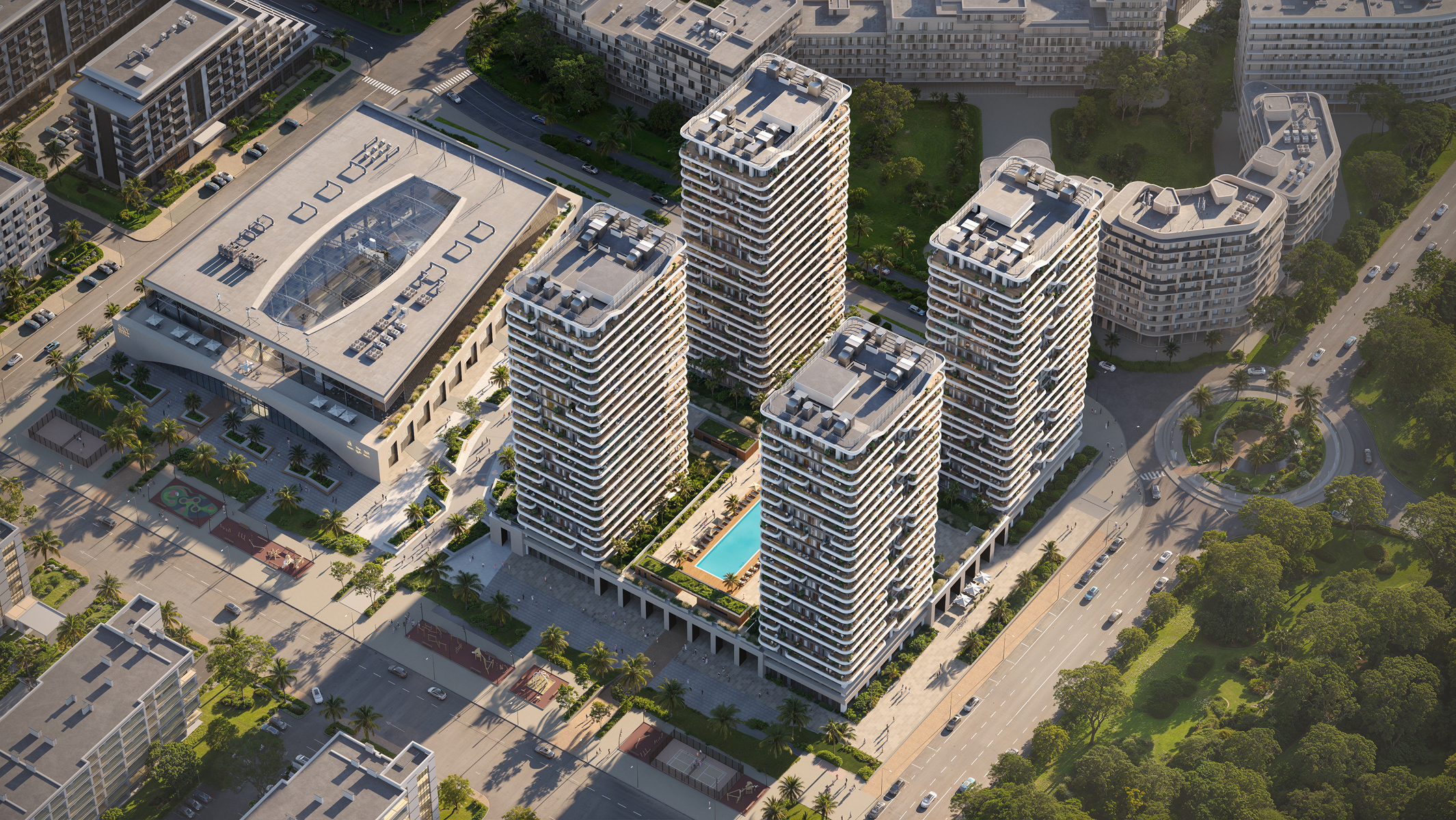 Aerial view of three modern Sky Park apartment buildings with a pool.