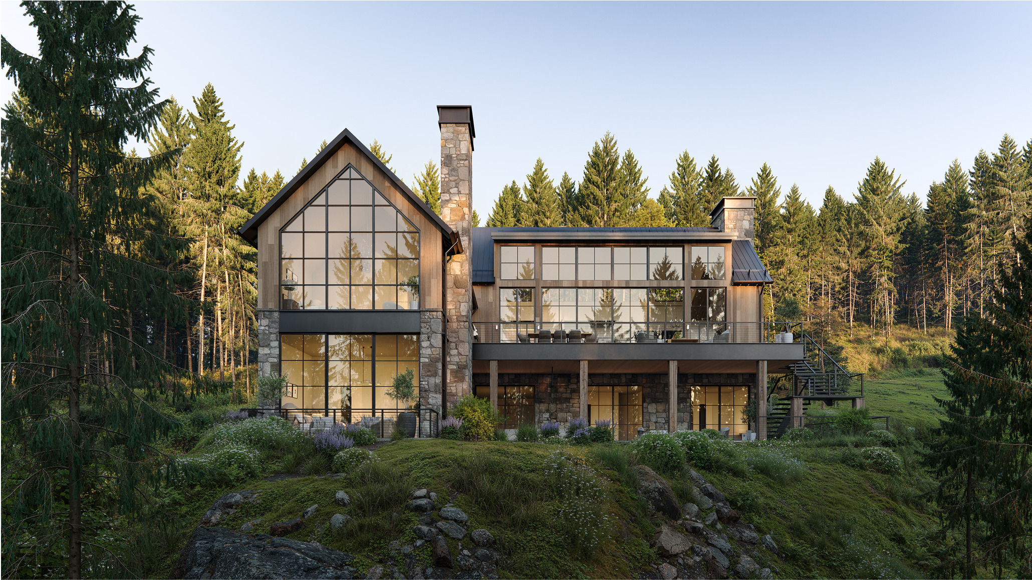 Modern Idaho Y-style home nestled in a pine forest. Large windows and stone exterior.