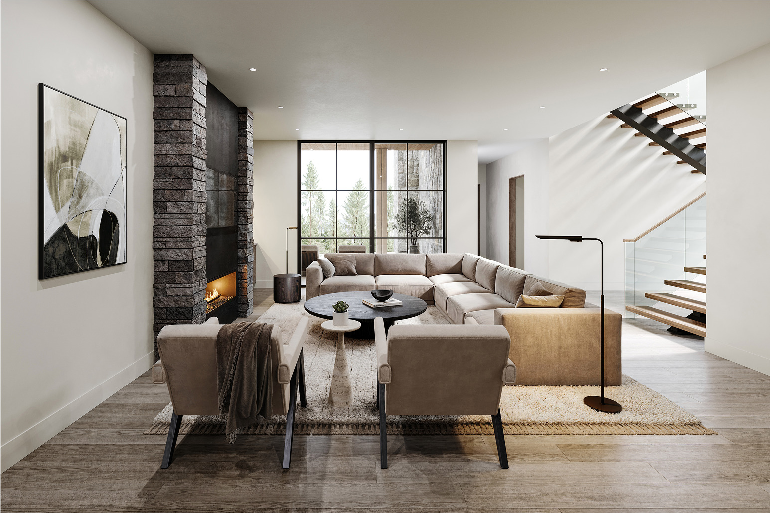 Modern living room with stone fireplace, sectional sofa, and large windows overlooking Idaho trees.