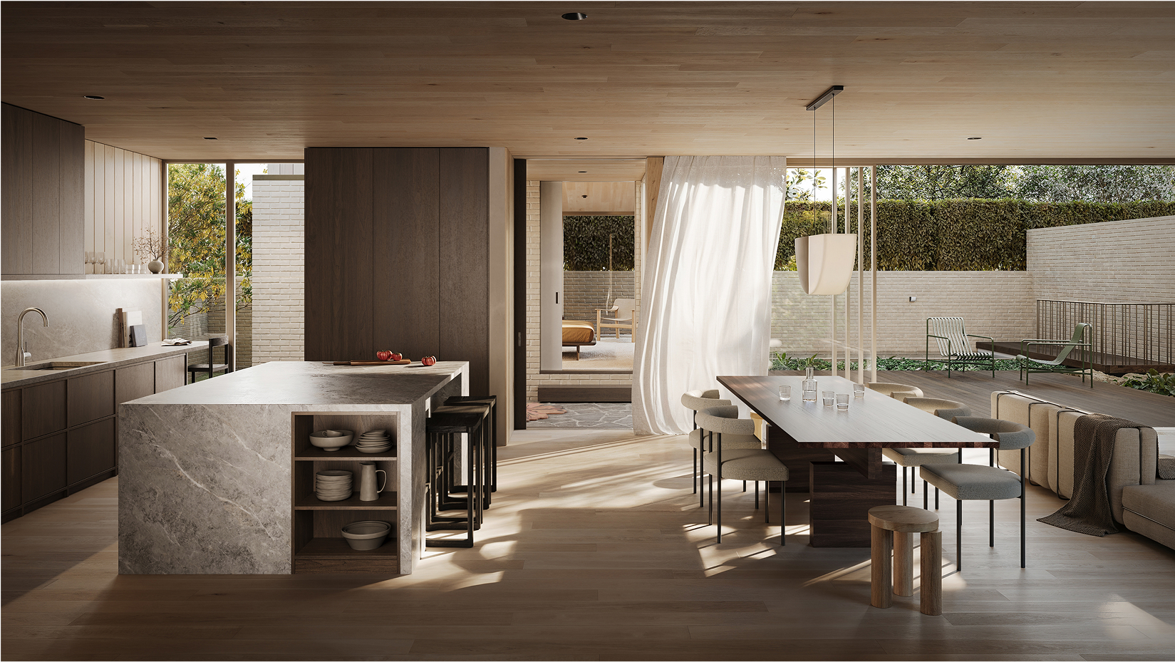 Modern kitchen and dining area opening to a private outdoor patio at Sackville.