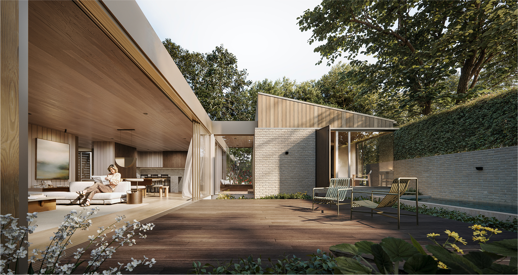 Modern home with wood and brick exterior, spacious deck, and lush landscaping. A woman relaxes inside.