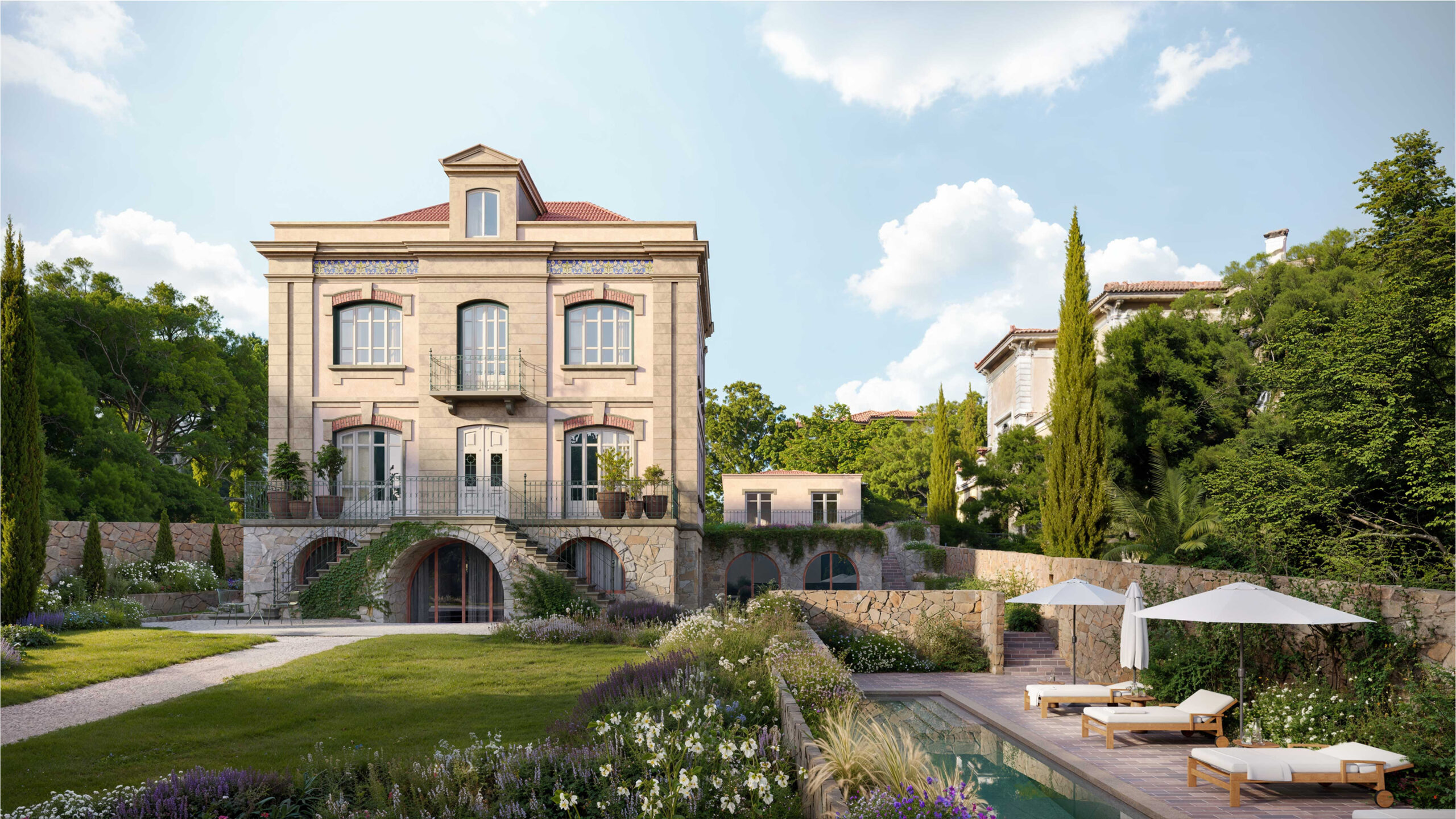 Luxury Vila Amália estate with pool and manicured gardens.