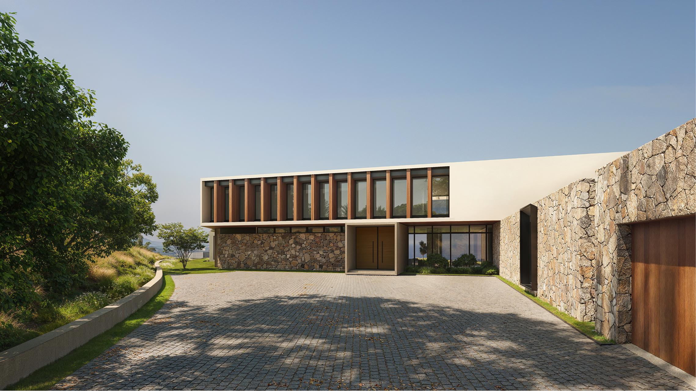 Modern home on Via Santa Ynez with stone and wood accents.