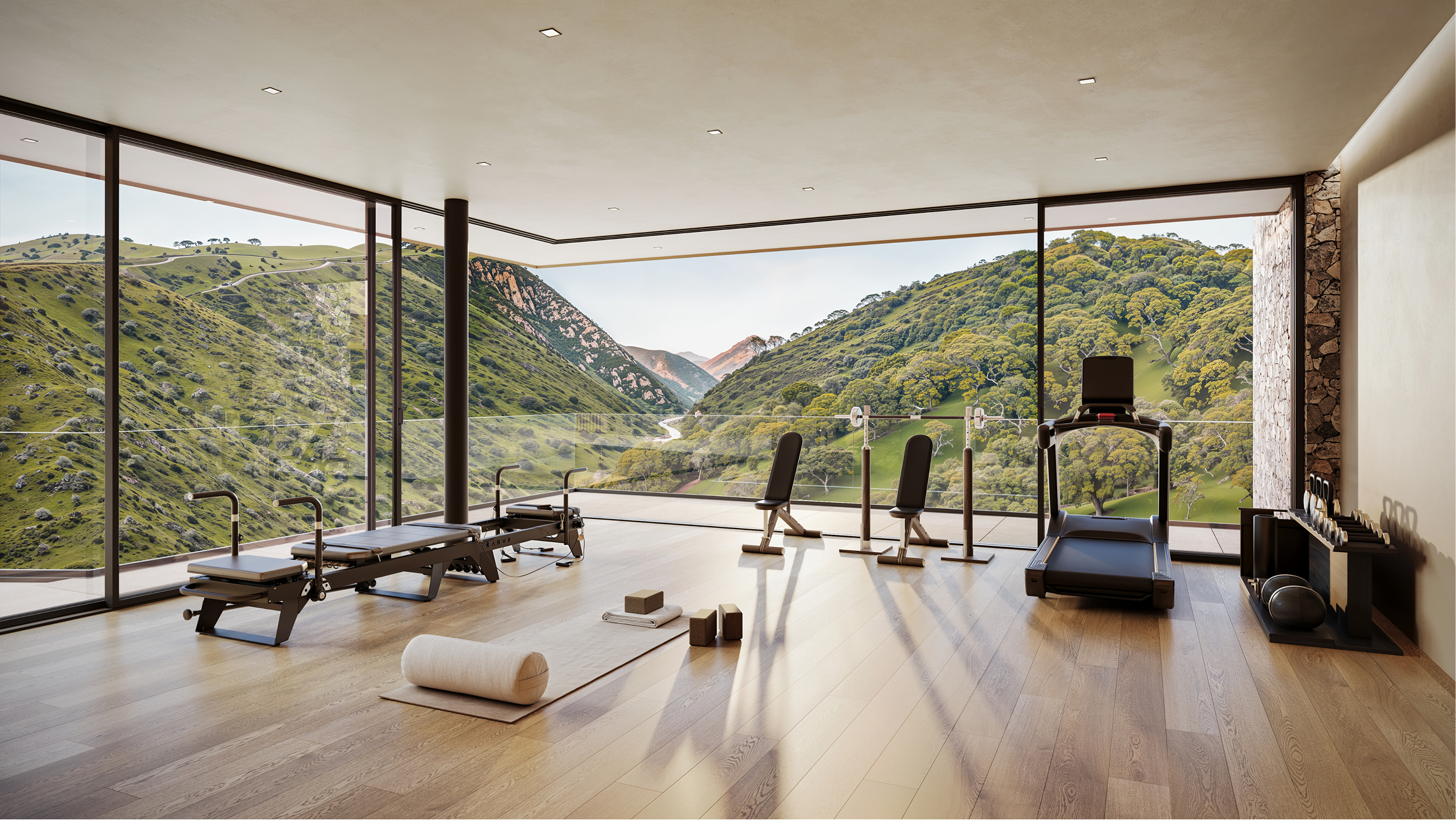Luxury home gym with stunning Via Santa Ynez mountain views; featuring Pilates reformer, treadmill, and weight bench.