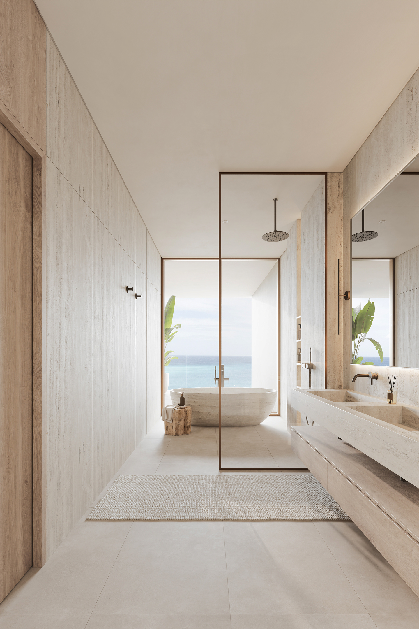 Luxurious bathroom at One Carlisle Bay with ocean view, freestanding tub, and double vanity.