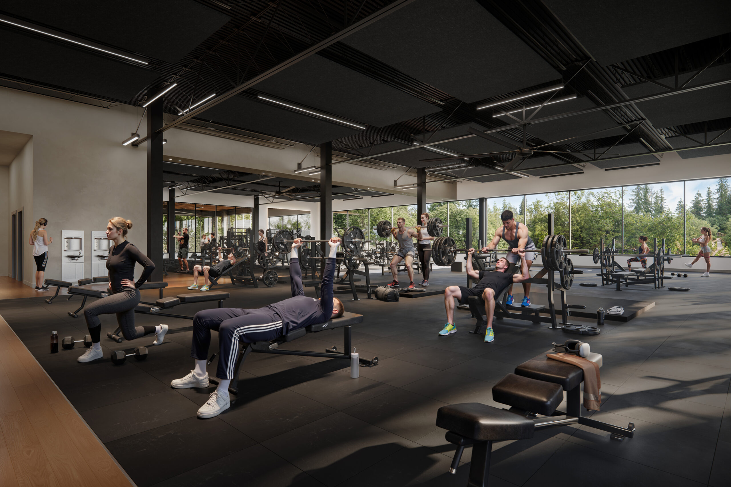 Modern Athens Athletic Club gym with people weight training and using exercise equipment.