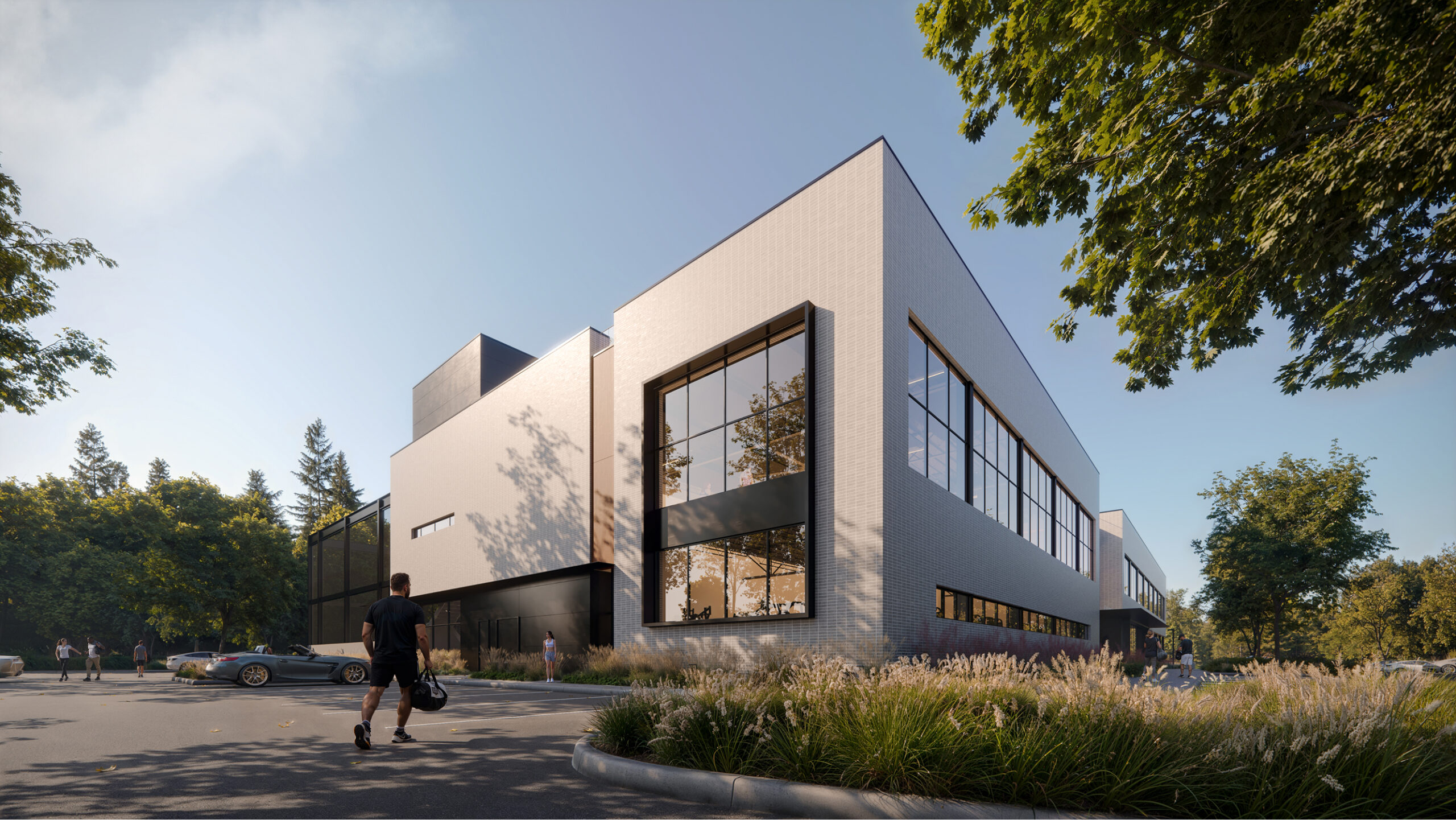 Modern Athens Athletic Club building with large windows and a person walking towards the entrance.