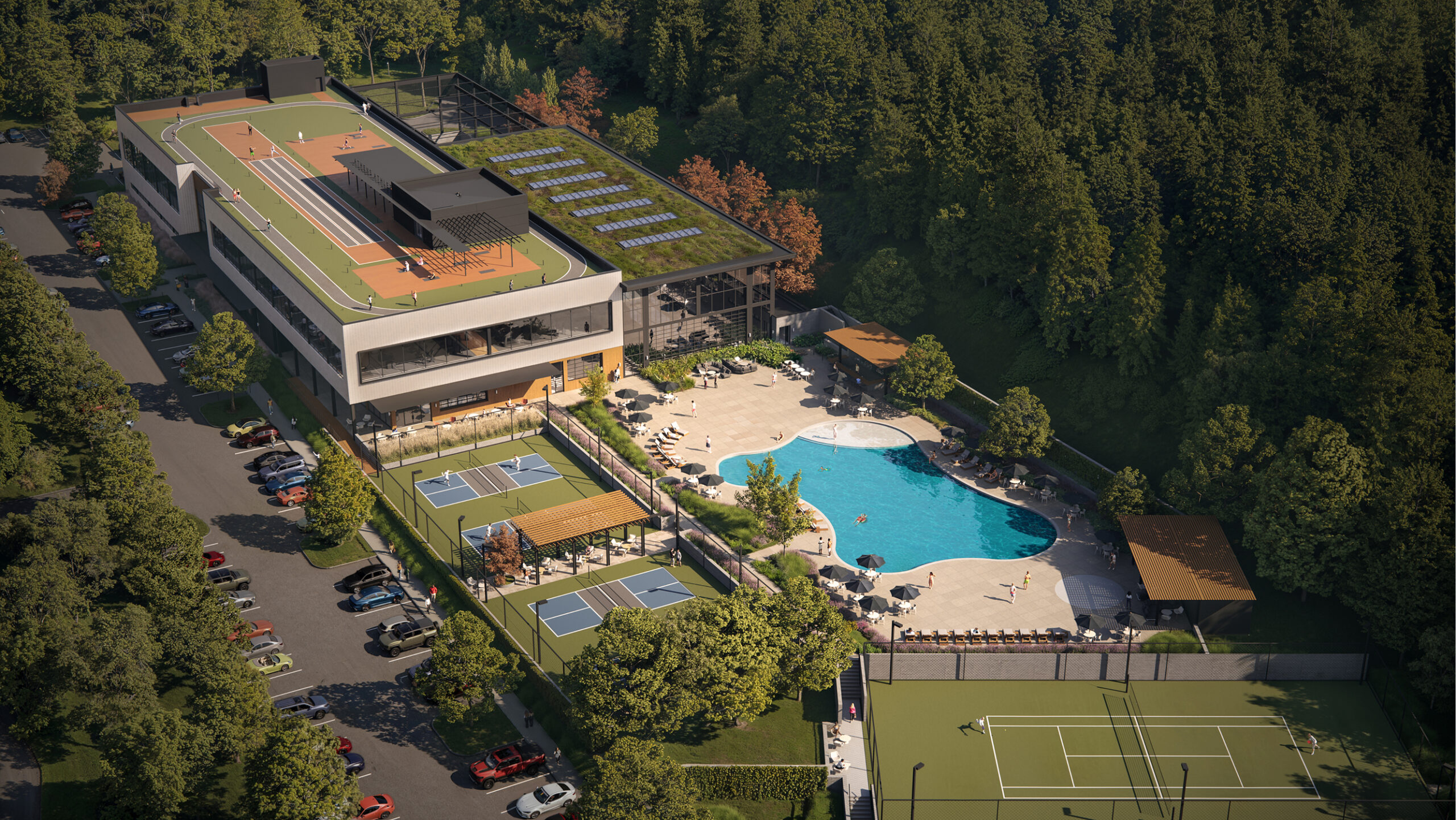 Aerial view of Athens Athletic Club: pool, tennis courts, pickleball courts, and fitness center with rooftop track.