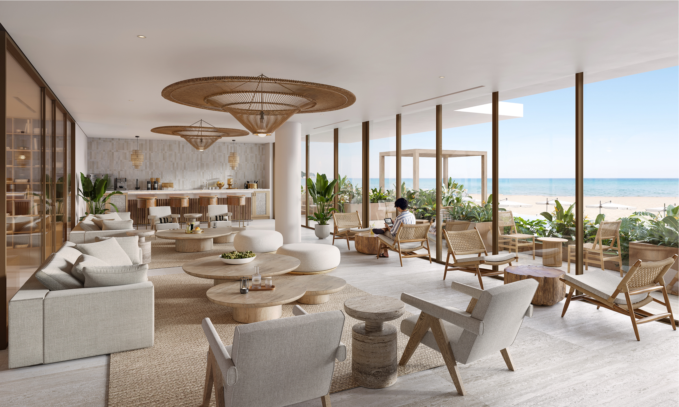 Relaxing lounge area at One Carlisle Bay with ocean views, featuring comfortable seating and stylish decor.