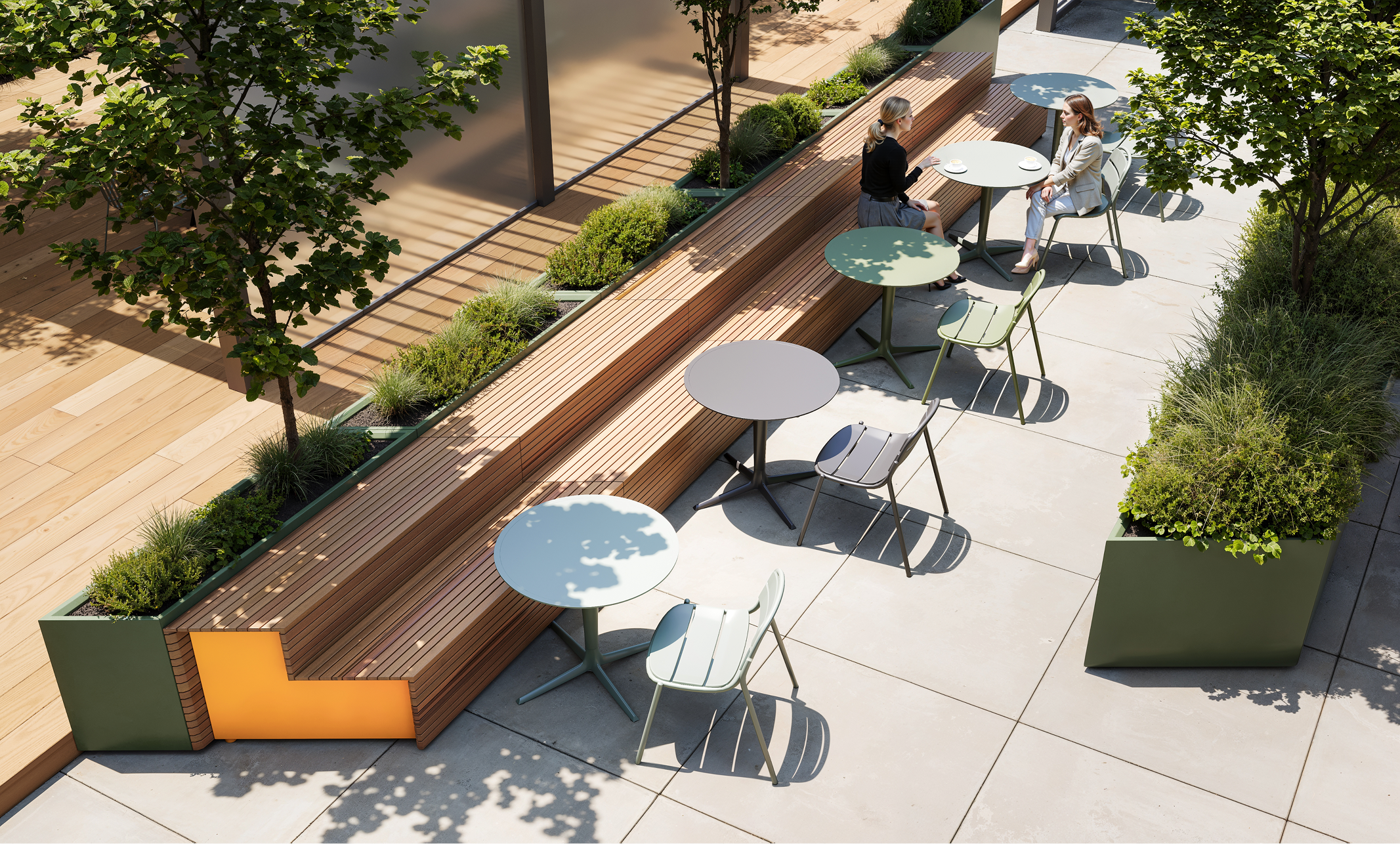 Outdoor office space with women at tables, lush greenery, and modern design elements.